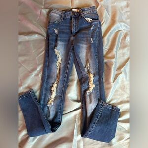 Rue 21 darkwash pants. They’re in good condition.